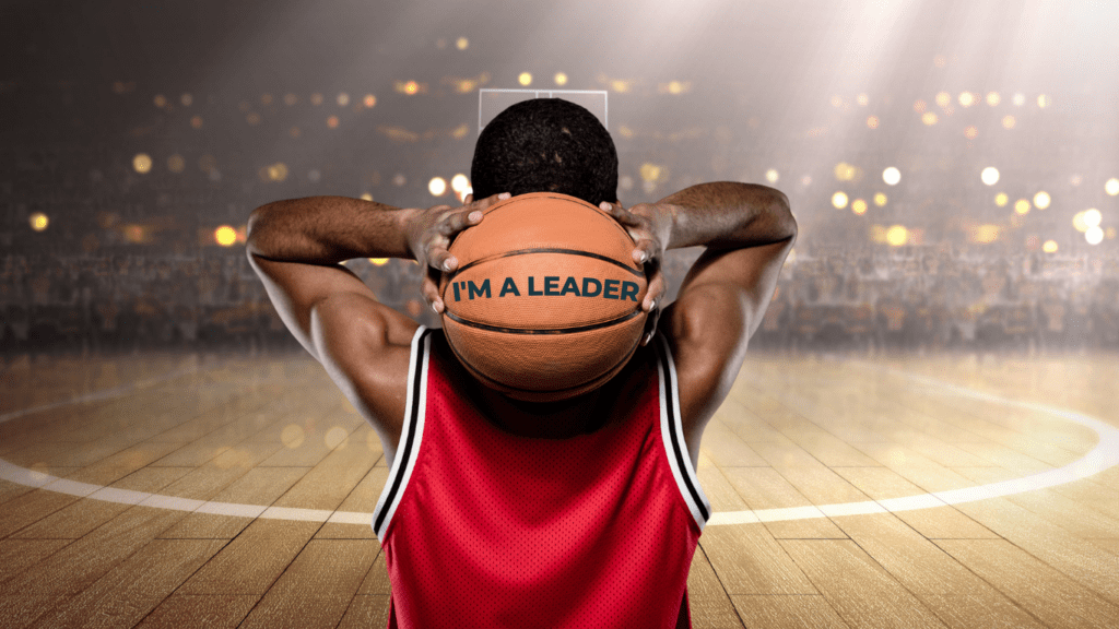 Homme en maillot de basket qui tient un ballon